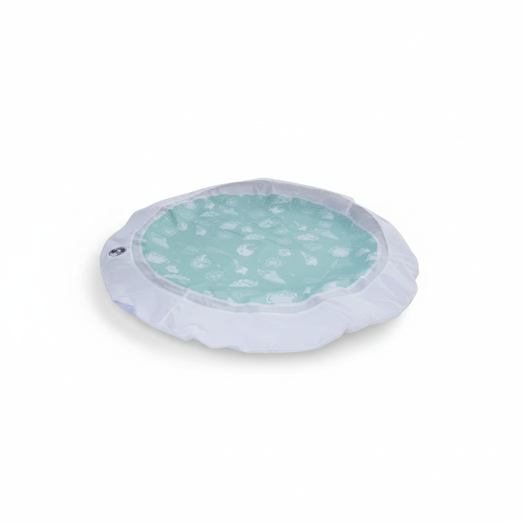 Little Ocean portable beach pool made from recycled fabric with a white border and mint green seashell pattern base.