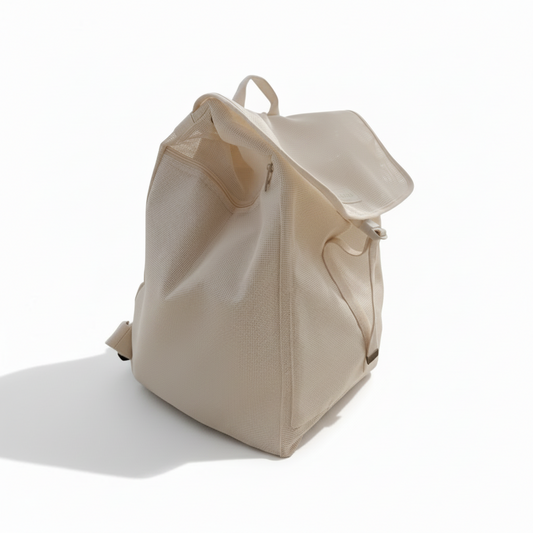 Little Ocean beige recycled mesh beach bag with a 60L capacity, thermal cooler compartment, and cotton straps.